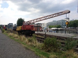 The crane pushes a coal wagon into the yard